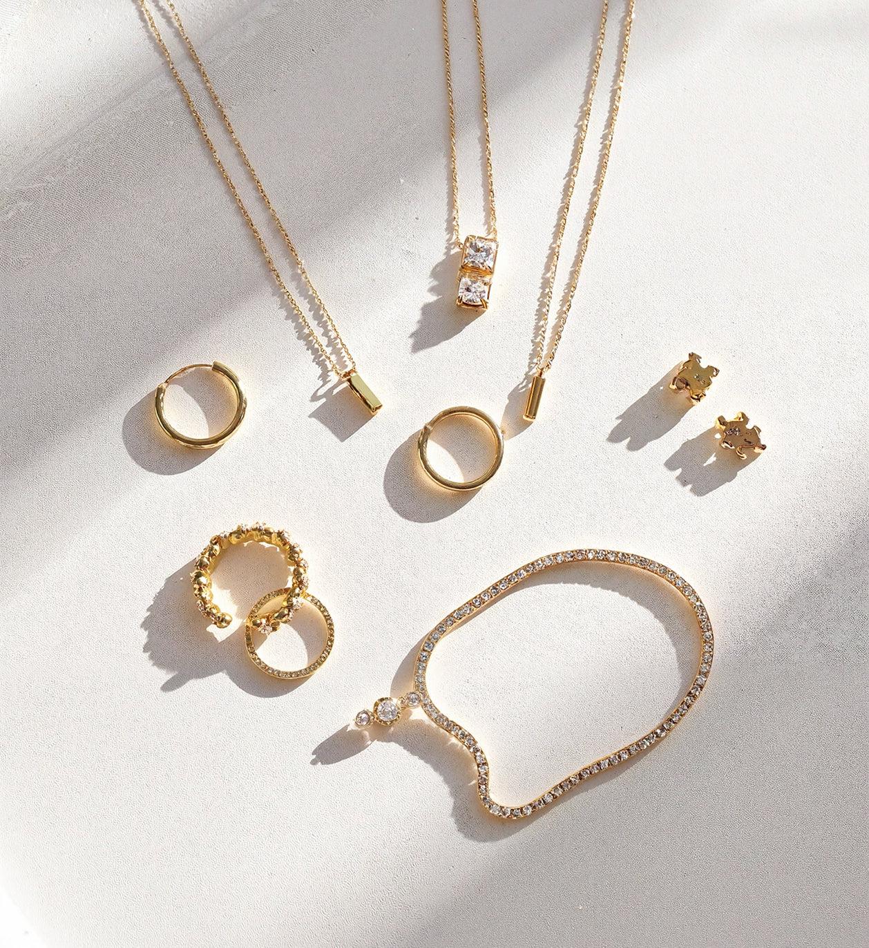 Trending Jewellery in 2026 featuring minimalist gold necklaces rings and earrings